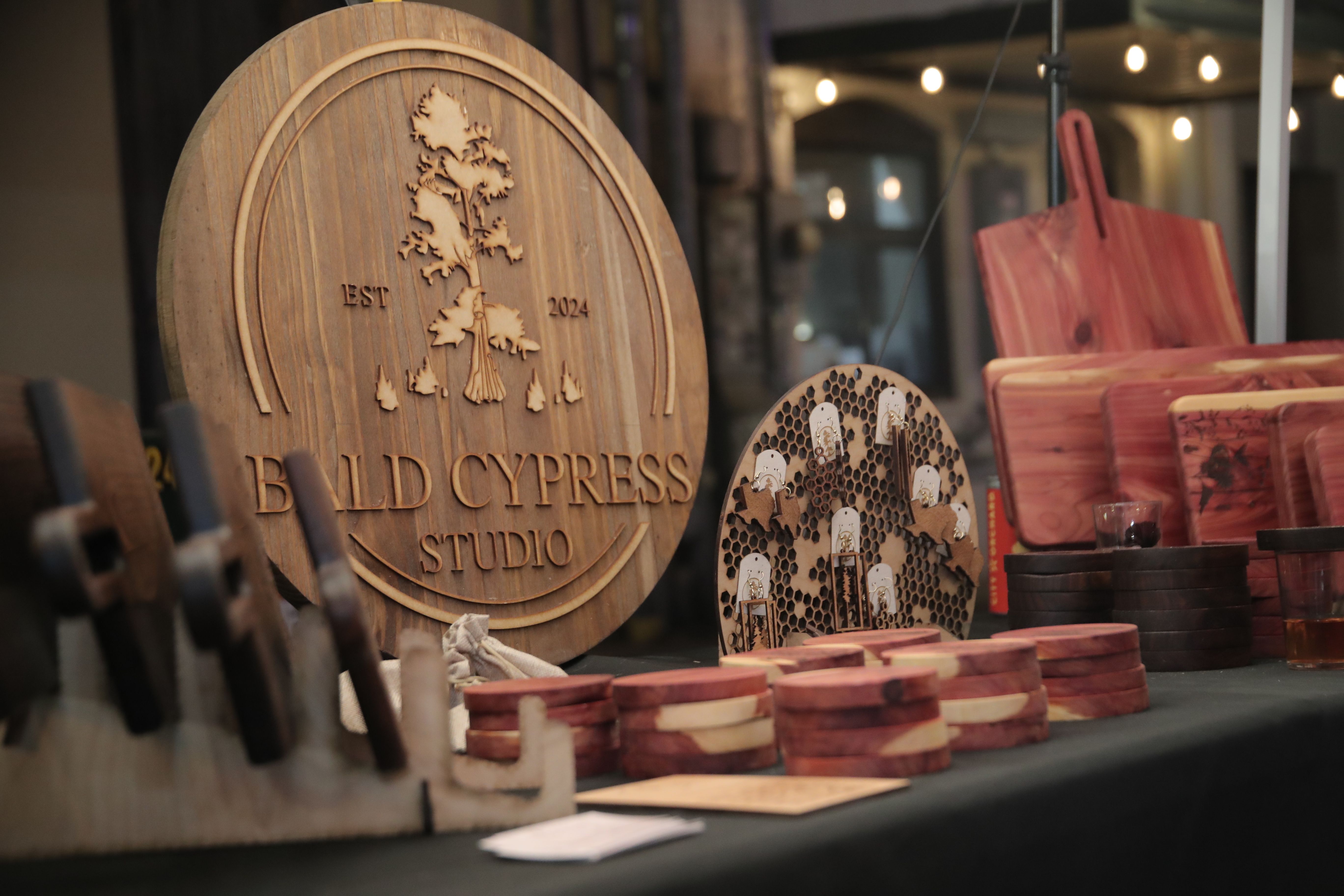 Bald Cypress Studio wooden crafts display with engraved logo and handcrafted wooden products